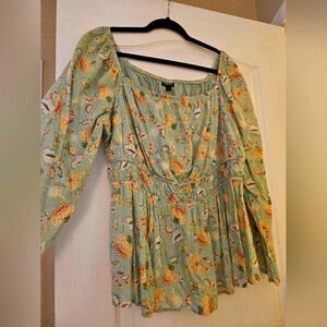 Floral green long sleeve baby doll blouse from Torrid.